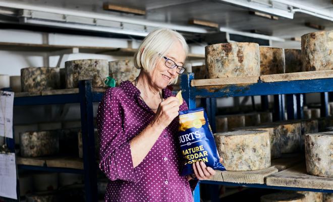 Burts_Quickes_Mary Quicke eating crisps