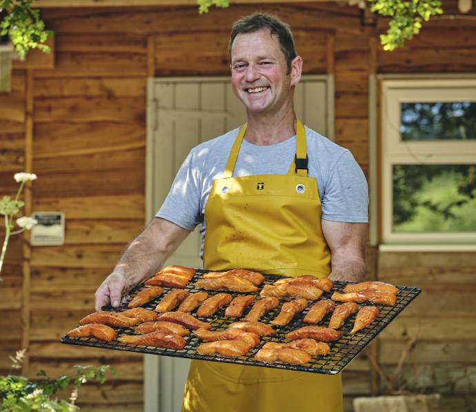 Blakewell Smokehouse_man holding tray of smoked fish