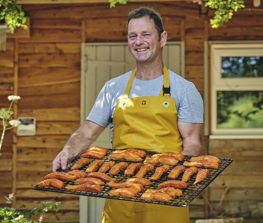 Blakewell Smokehouse_man holding tray of smoked fish