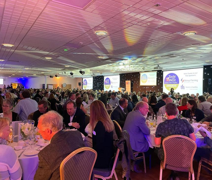 People sitting around large round tables at Taste of the West Award Ceremony